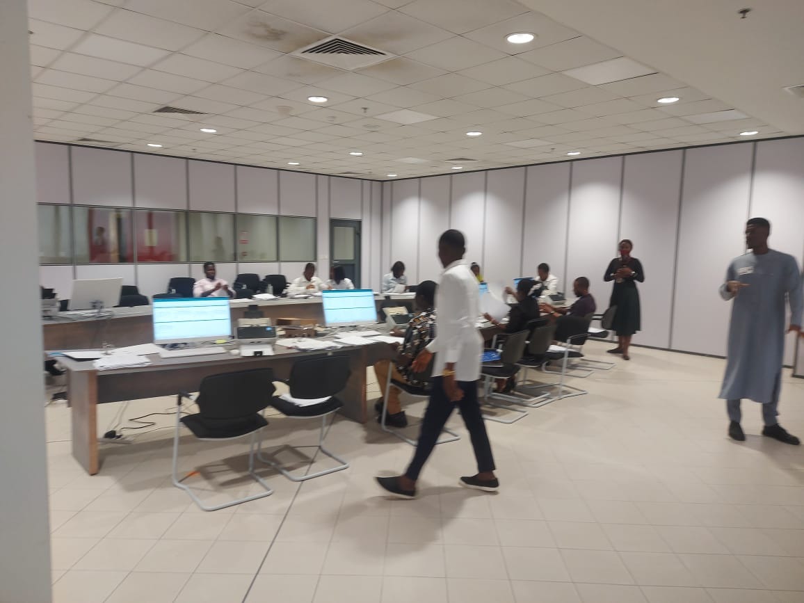 A team scanning and processing client files in a project workspace